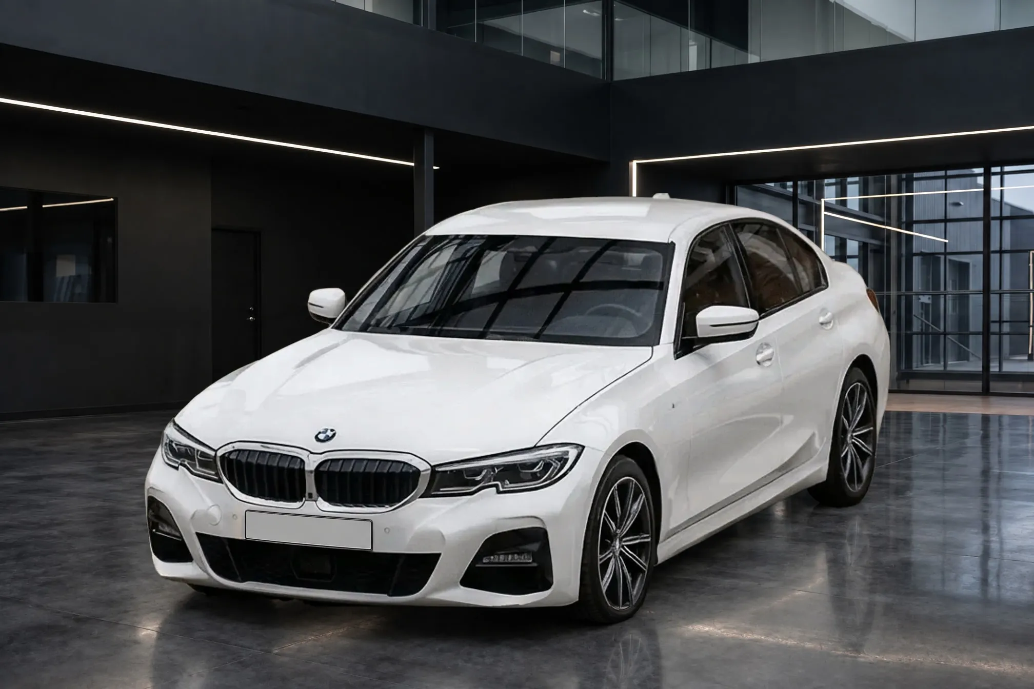 A white BMW 3 Series in a dark industrial showroom, finished by Clearcoat