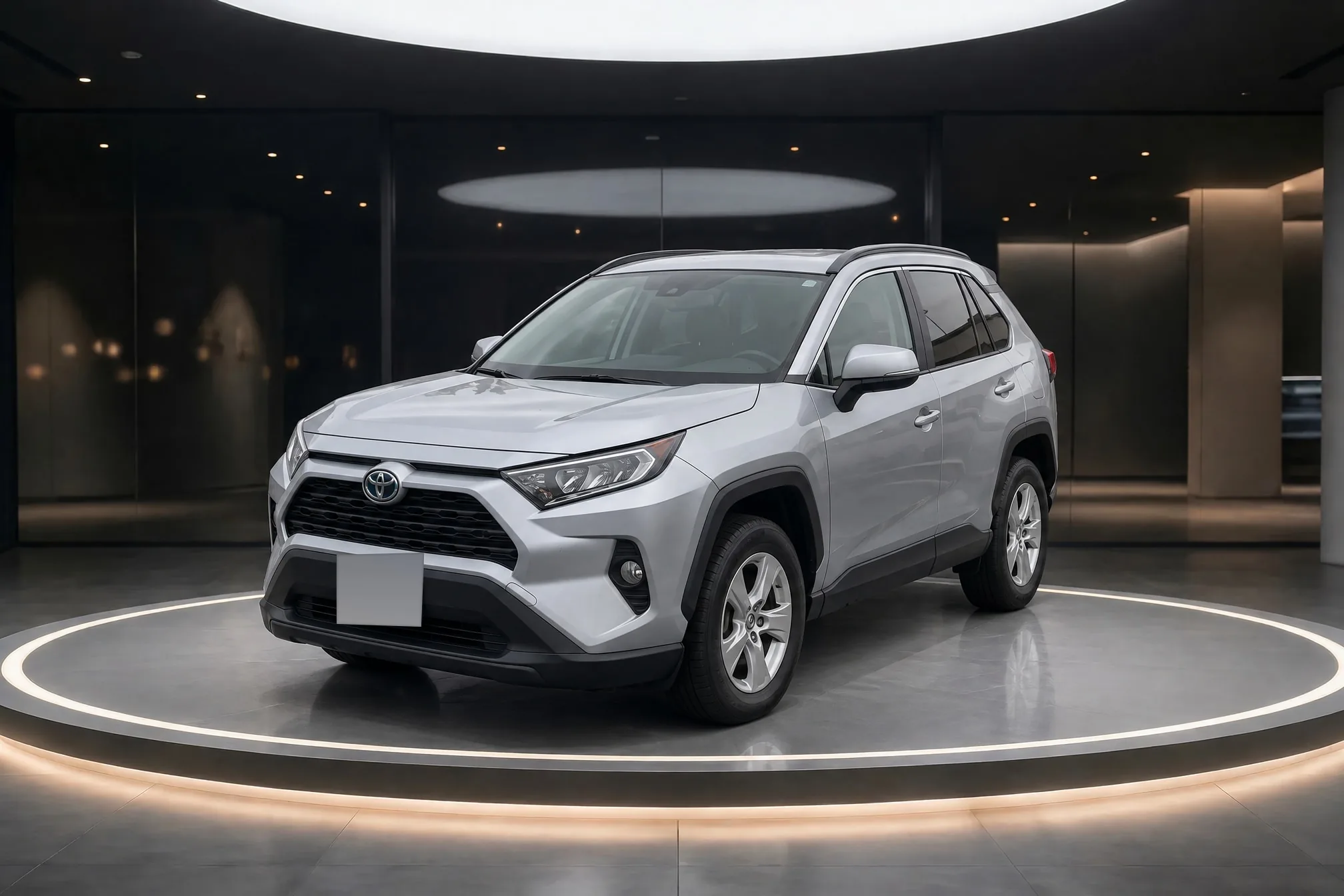 The same RAV4 from the lot photo, finished in the lit turntable